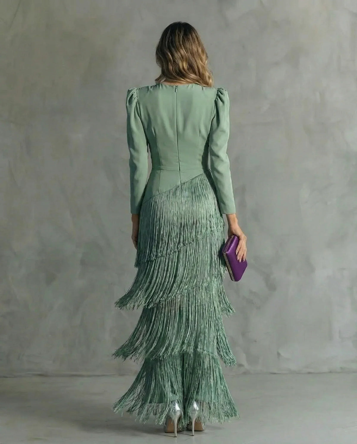 Clara™ | Elegante vestido midi con sofisticadas mangas de flecos