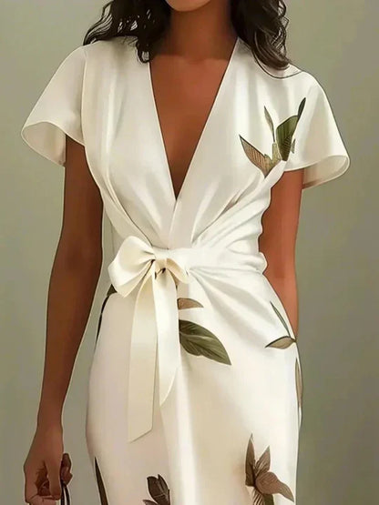 Elisa™ | Sofisticado vestido cruzado con hermoso estampado floral