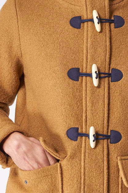 Trenca de lana cocida con capucha