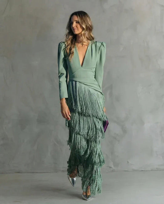 Clara™ | Elegante vestido midi con sofisticadas mangas de flecos