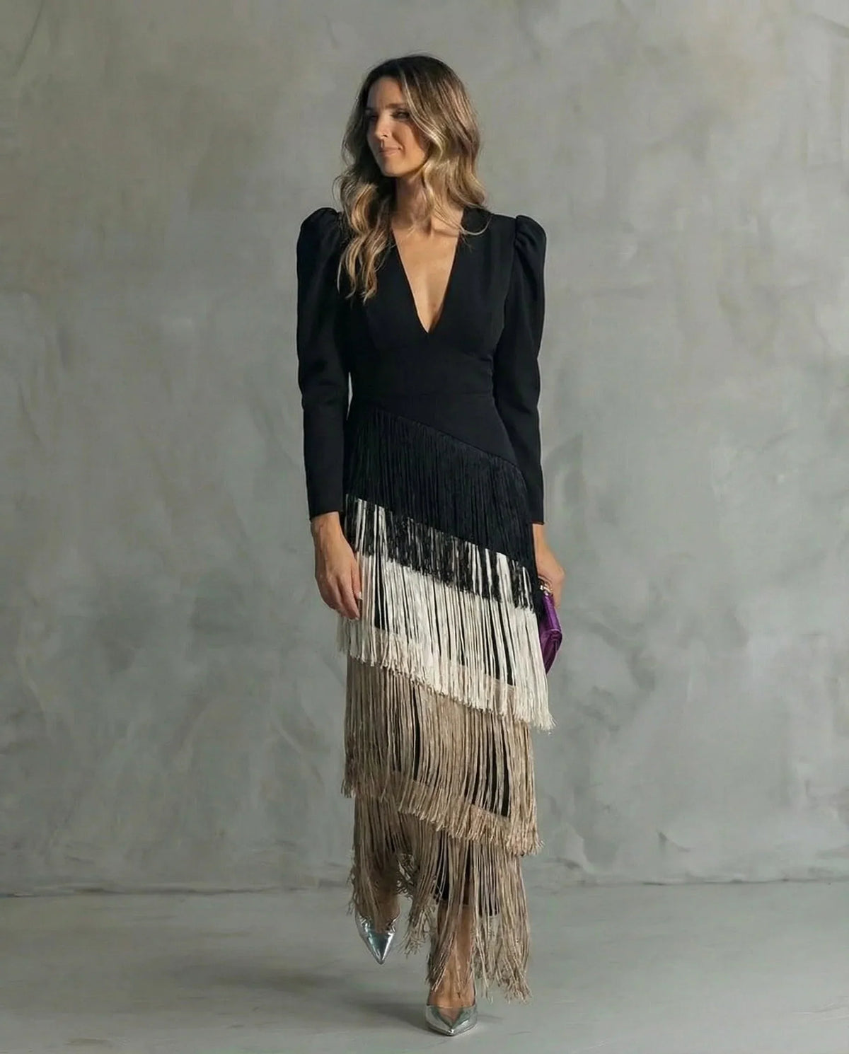 Clara™ | Elegante vestido midi con sofisticadas mangas de flecos