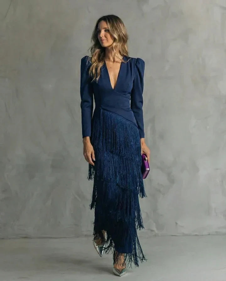 Clara™ | Elegante vestido midi con sofisticadas mangas de flecos