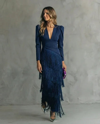 Clara™ | Elegante vestido midi con sofisticadas mangas de flecos