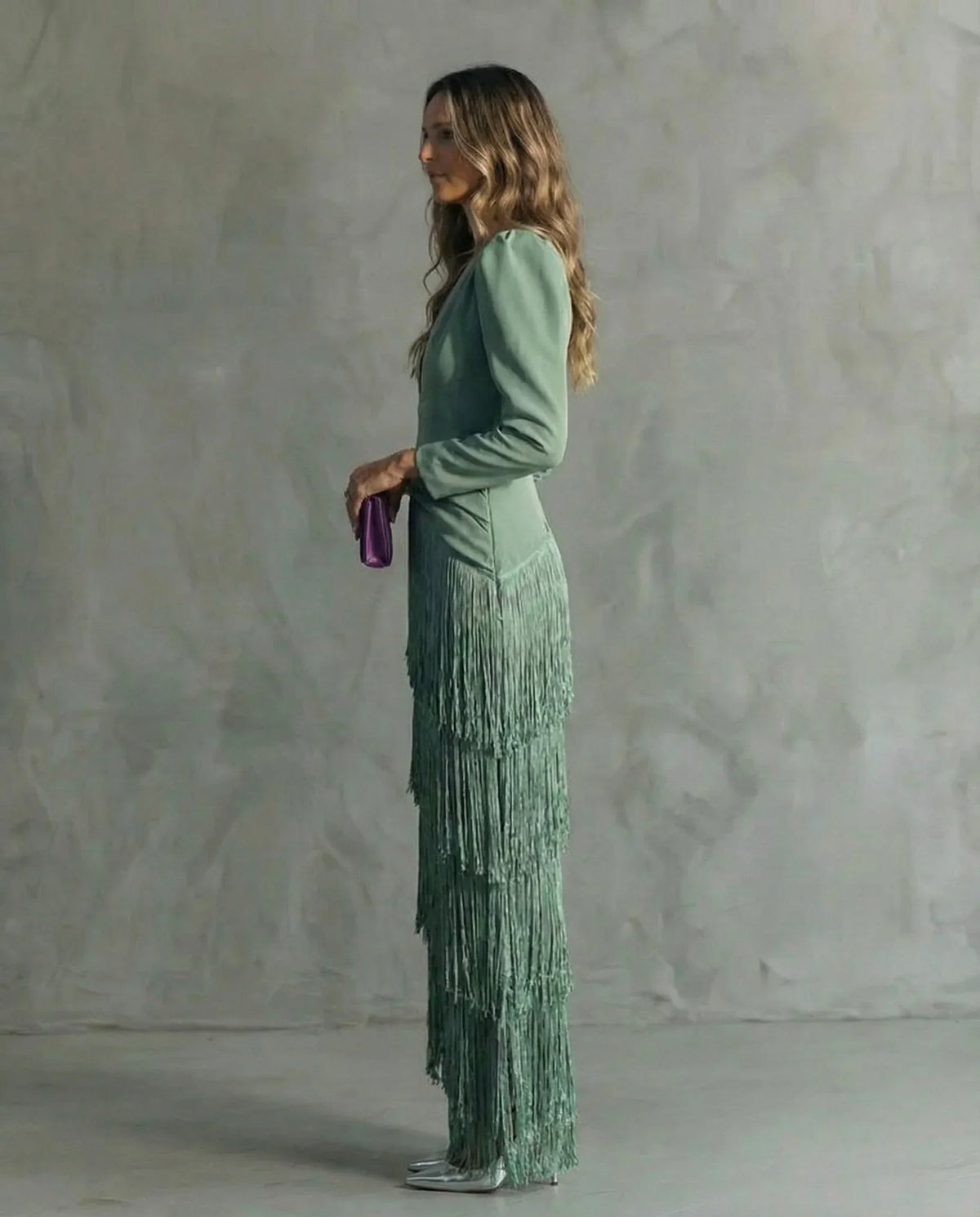Clara™ | Elegante vestido midi con sofisticadas mangas de flecos