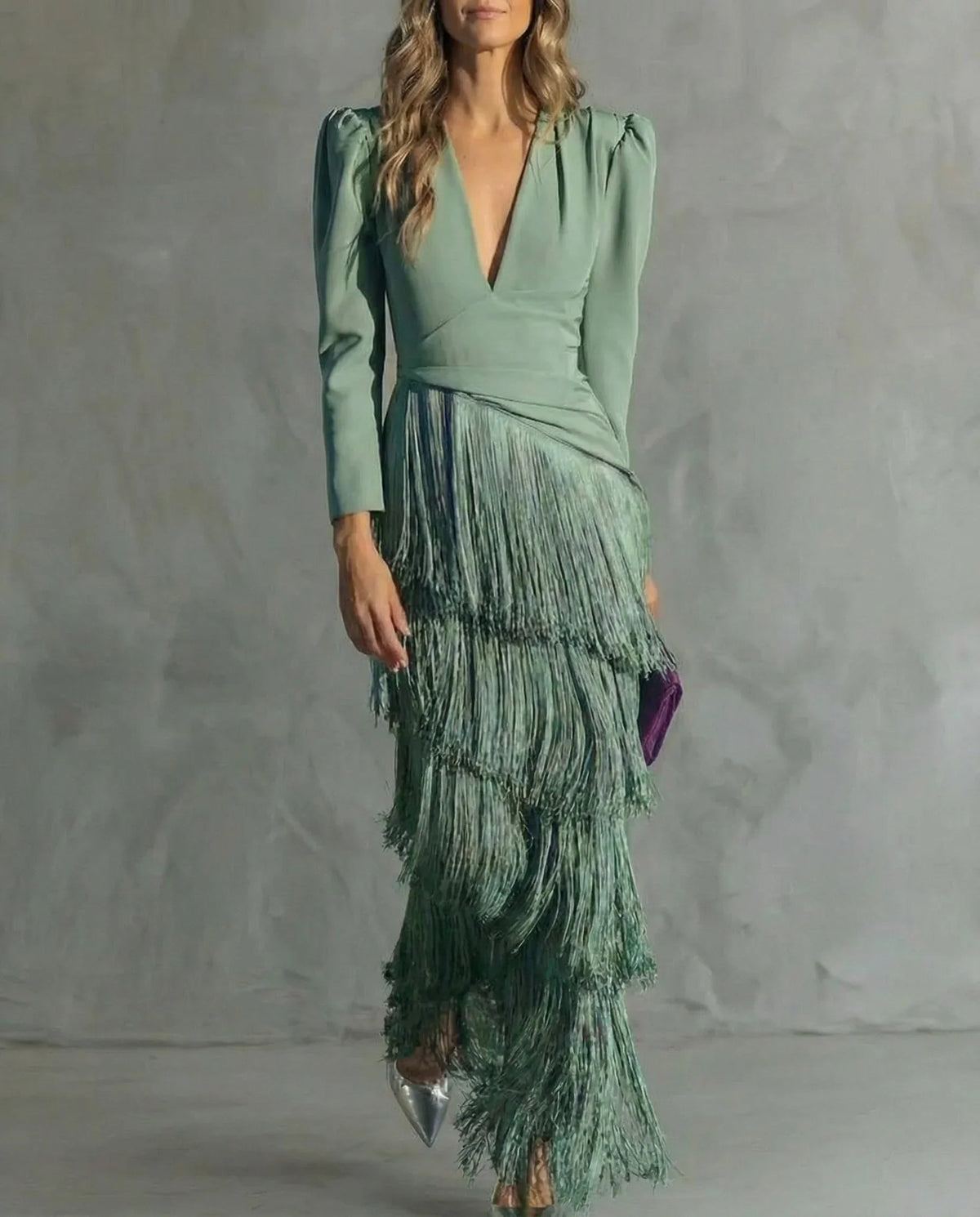 Clara™ | Elegante vestido midi con sofisticadas mangas de flecos